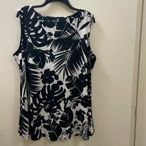 Black and white color sleeveless blouse